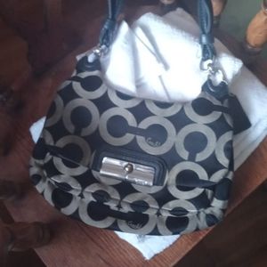 Coach purse 50 pumas 40 knife 25 bat 20 all items